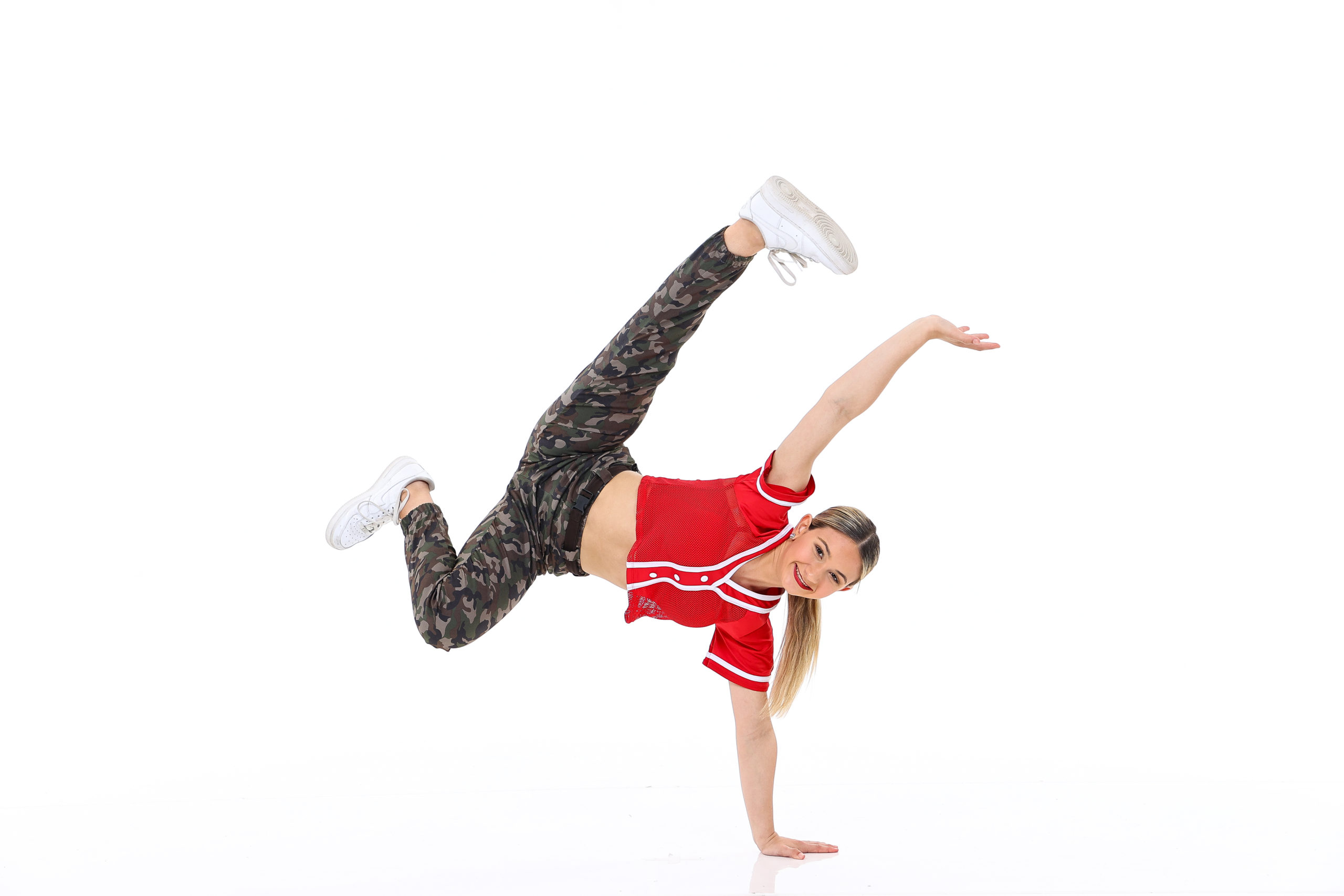 Premium Photo | Modern young beautiful dancer posing on a studio background